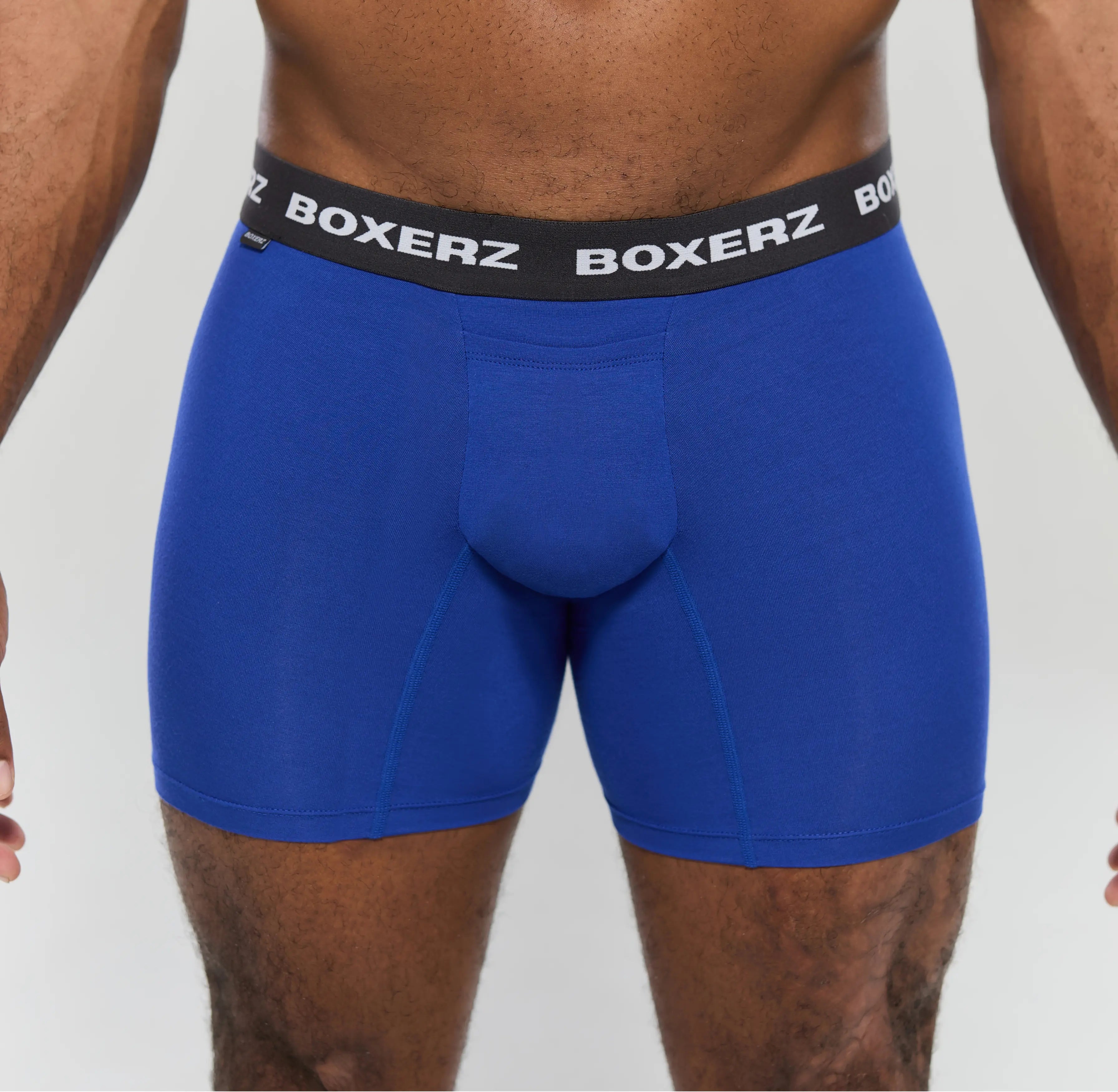 Front view of men’s blue boxer briefs from Boxerz, showing logo waistband and contoured pouch