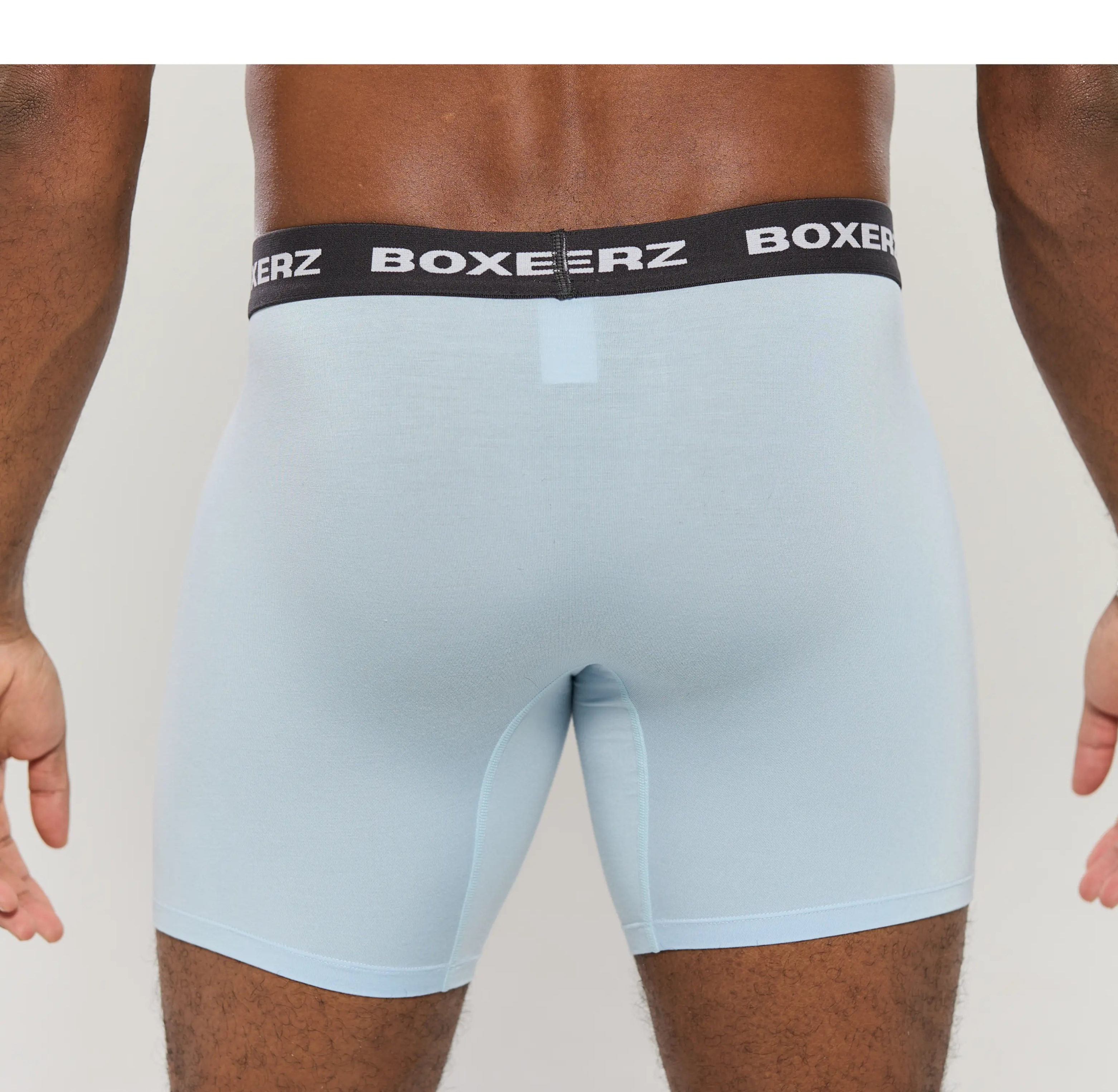 Rear view of men’s Carolina blue boxer briefs from Boxerz, showcasing seamless fit and supportive design
