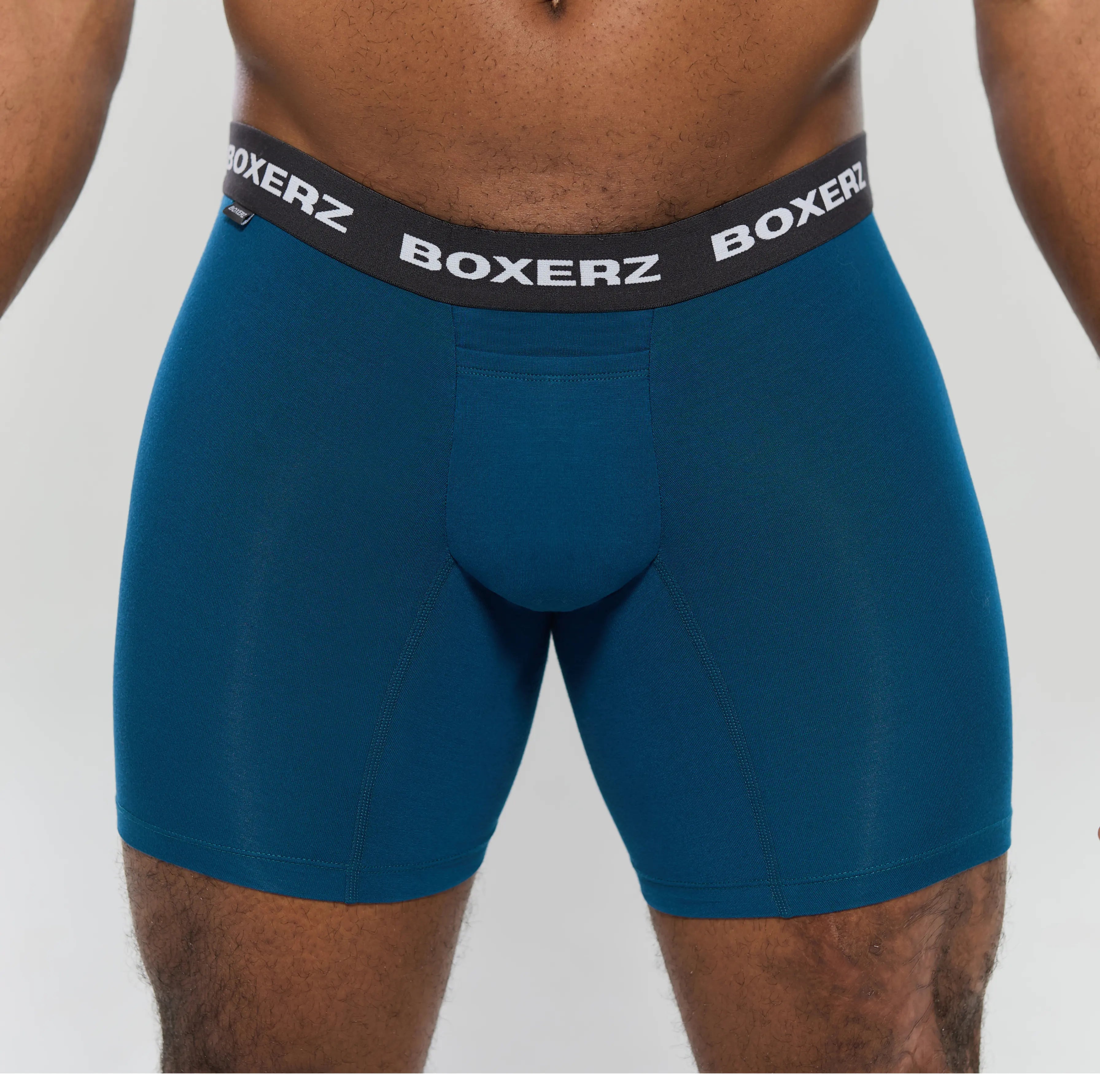 Front view of men’s midnight blue boxer briefs from Boxerz, showing logo waistband and contoured pouch