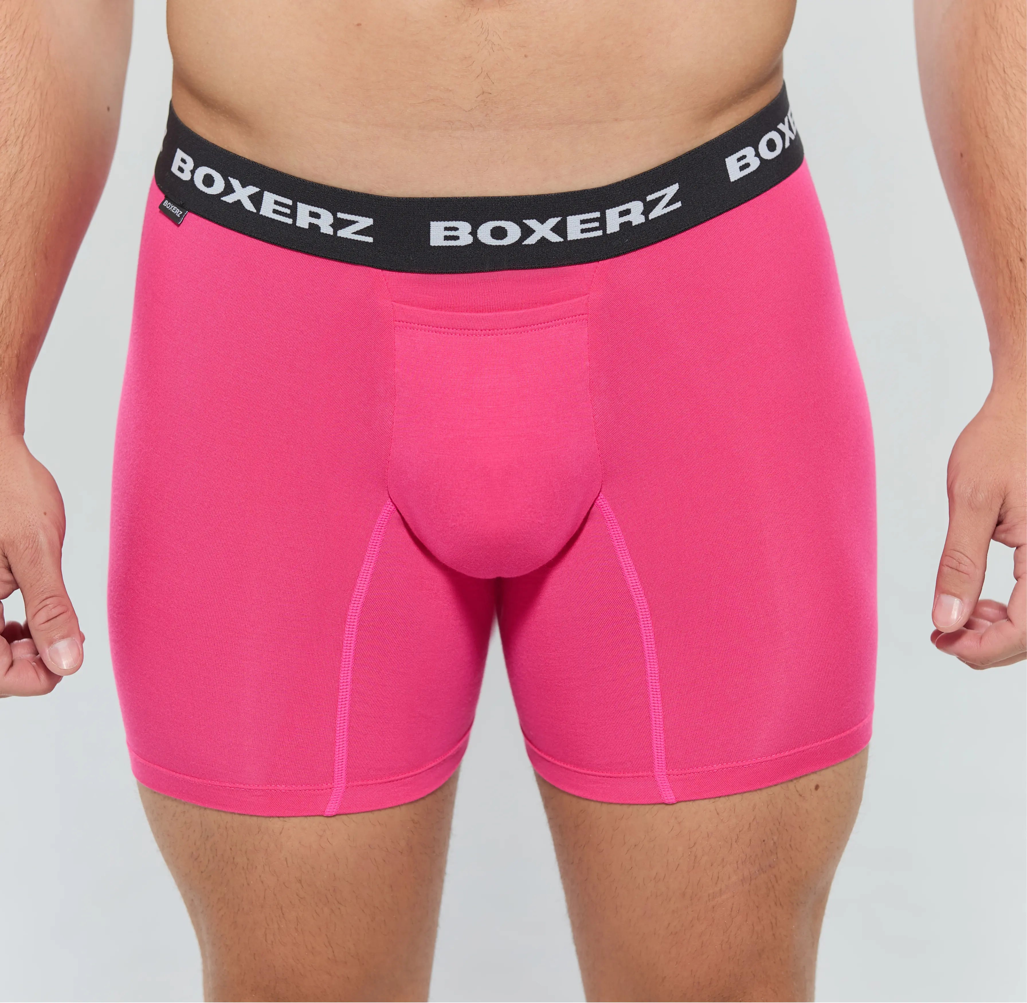 Front view of men’s pink boxer briefs from Boxerz, showing logo waistband and contoured pouch