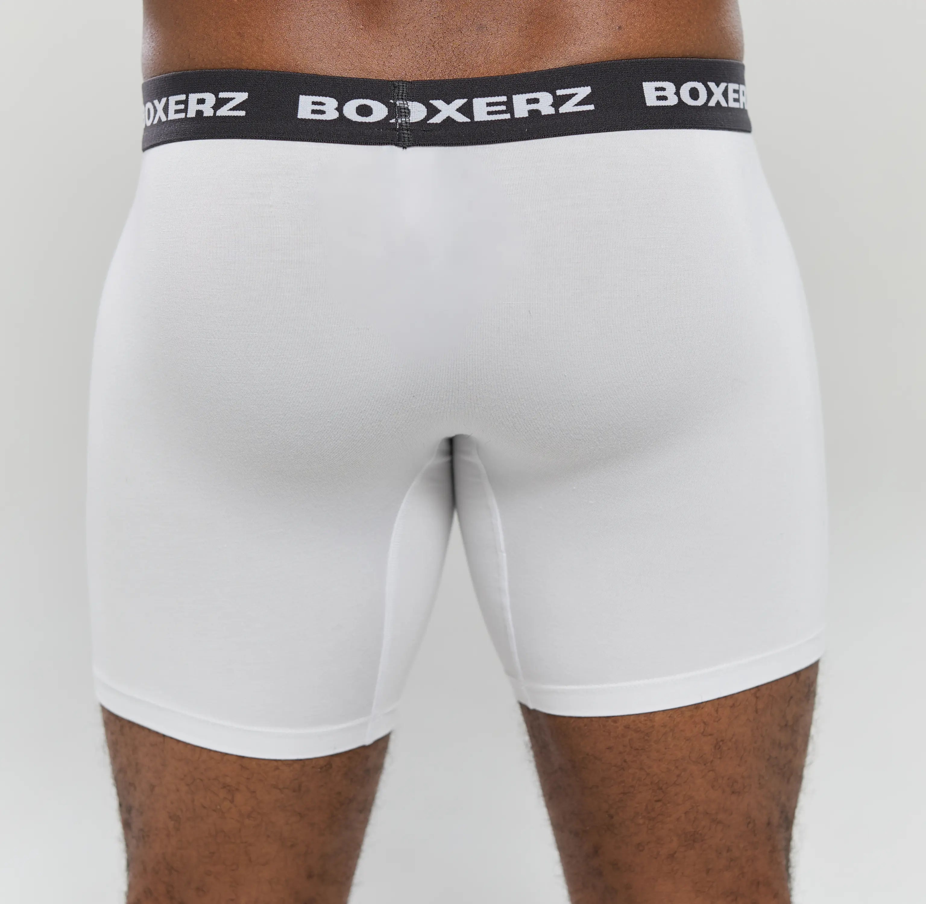 Rear view of men’s white boxer briefs from Boxerz, showcasing seamless fit and supportive design