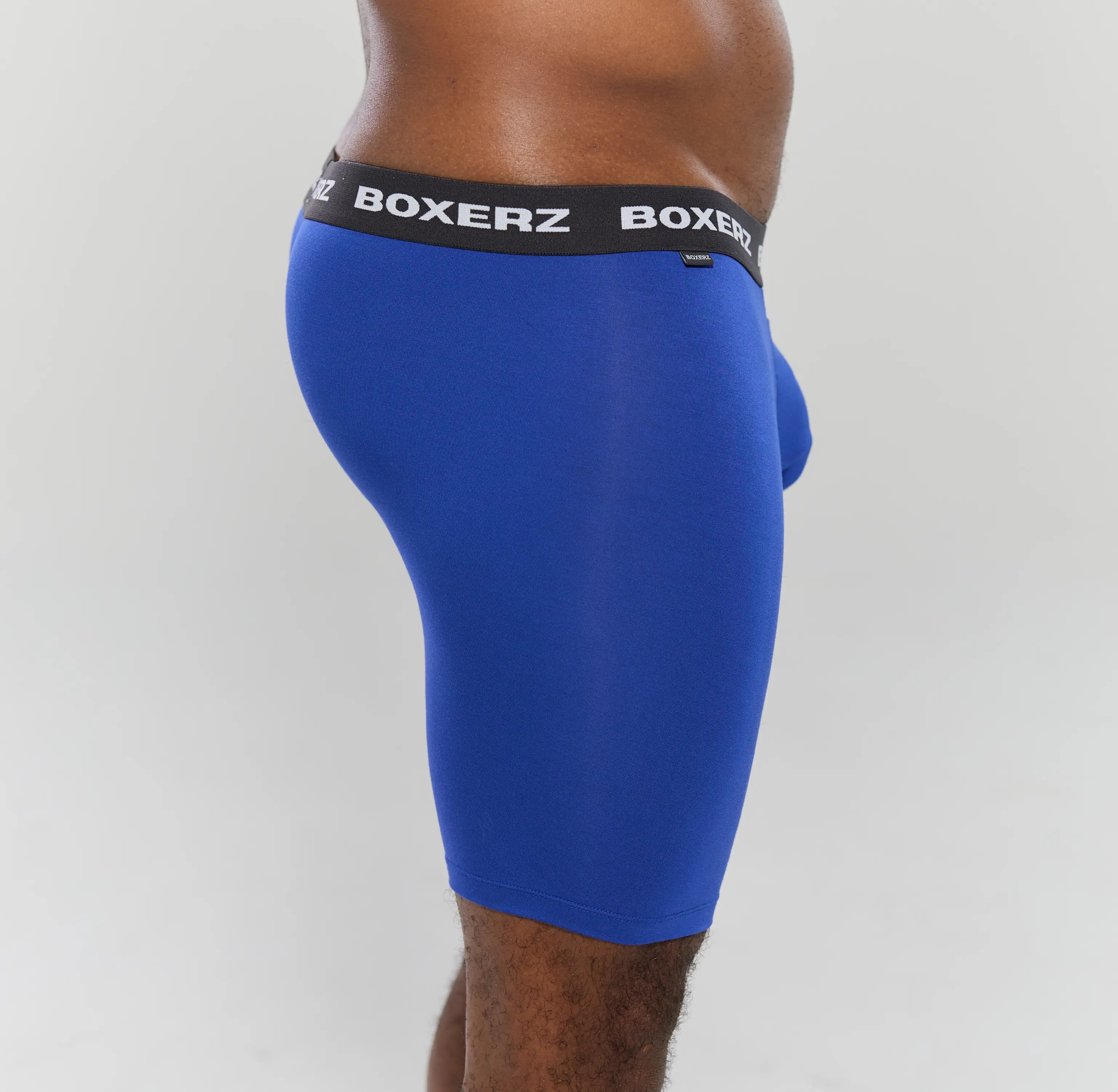 Side profile of Boxerz blue boxer briefs, highlighting snug fit and stretch fabric