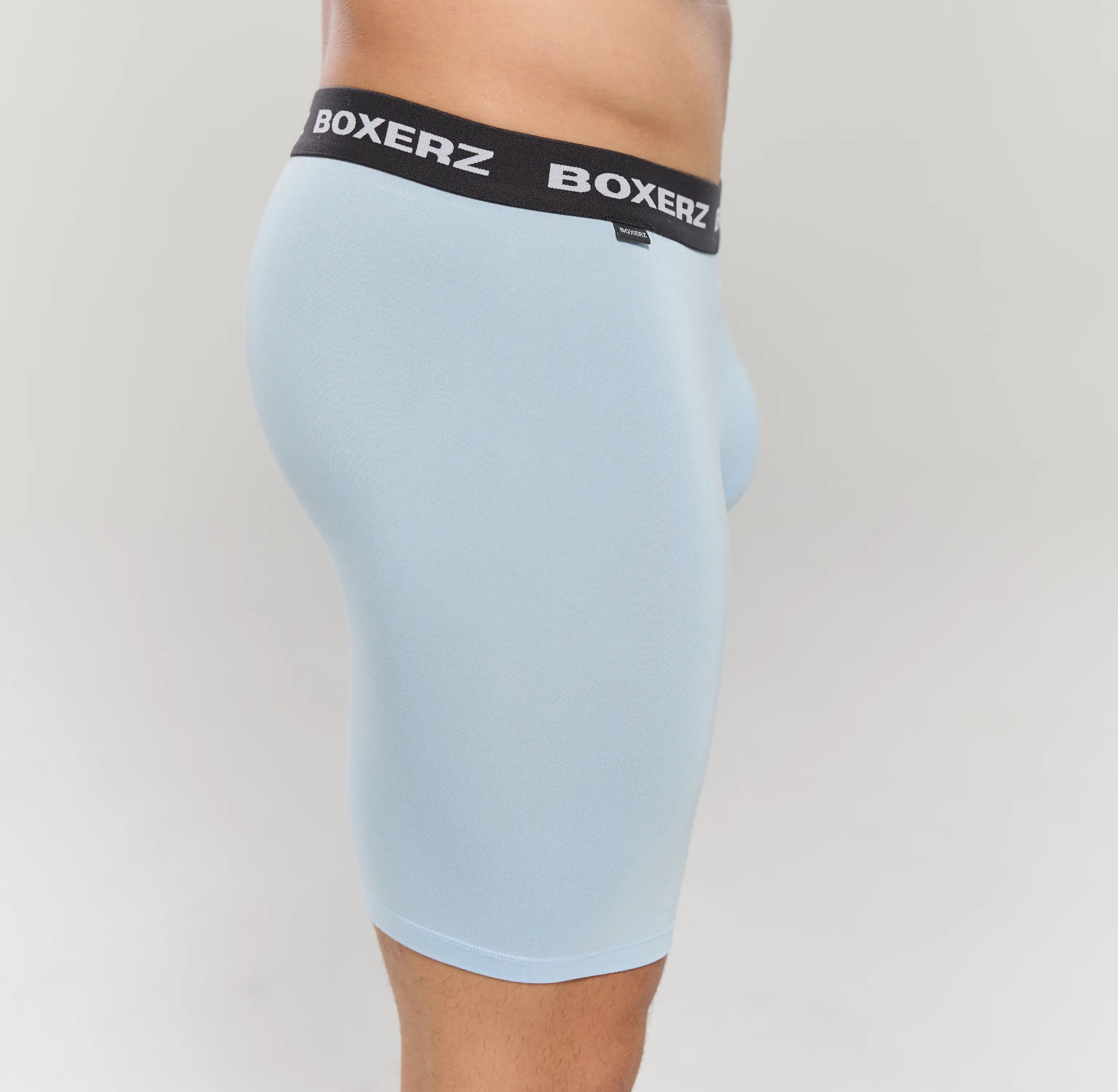 Side profile of Boxerz Carolina blue boxer briefs, highlighting snug fit and stretch fabric