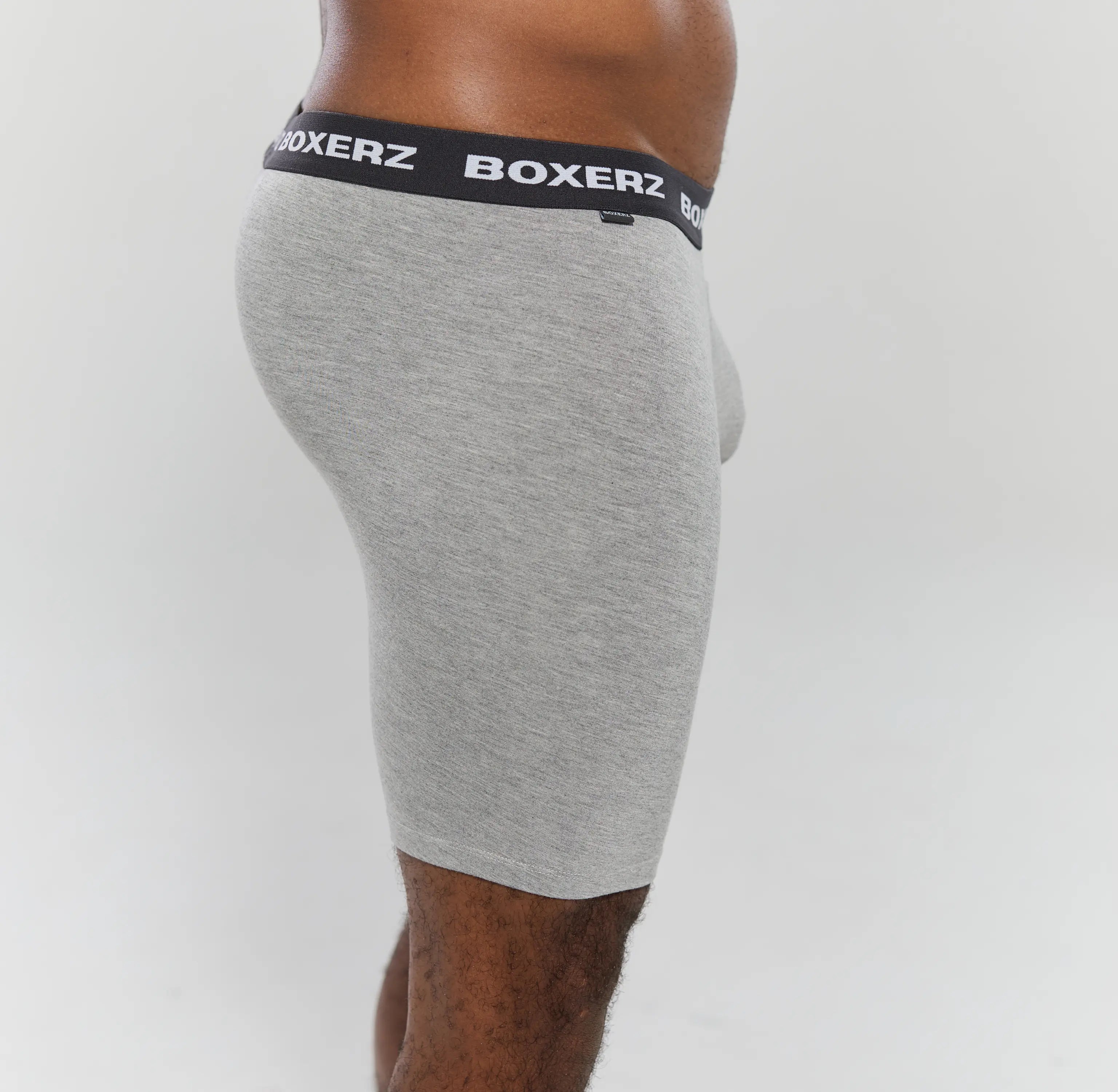 Side profile of Boxerz grey boxer briefs, highlighting snug fit and stretch fabric