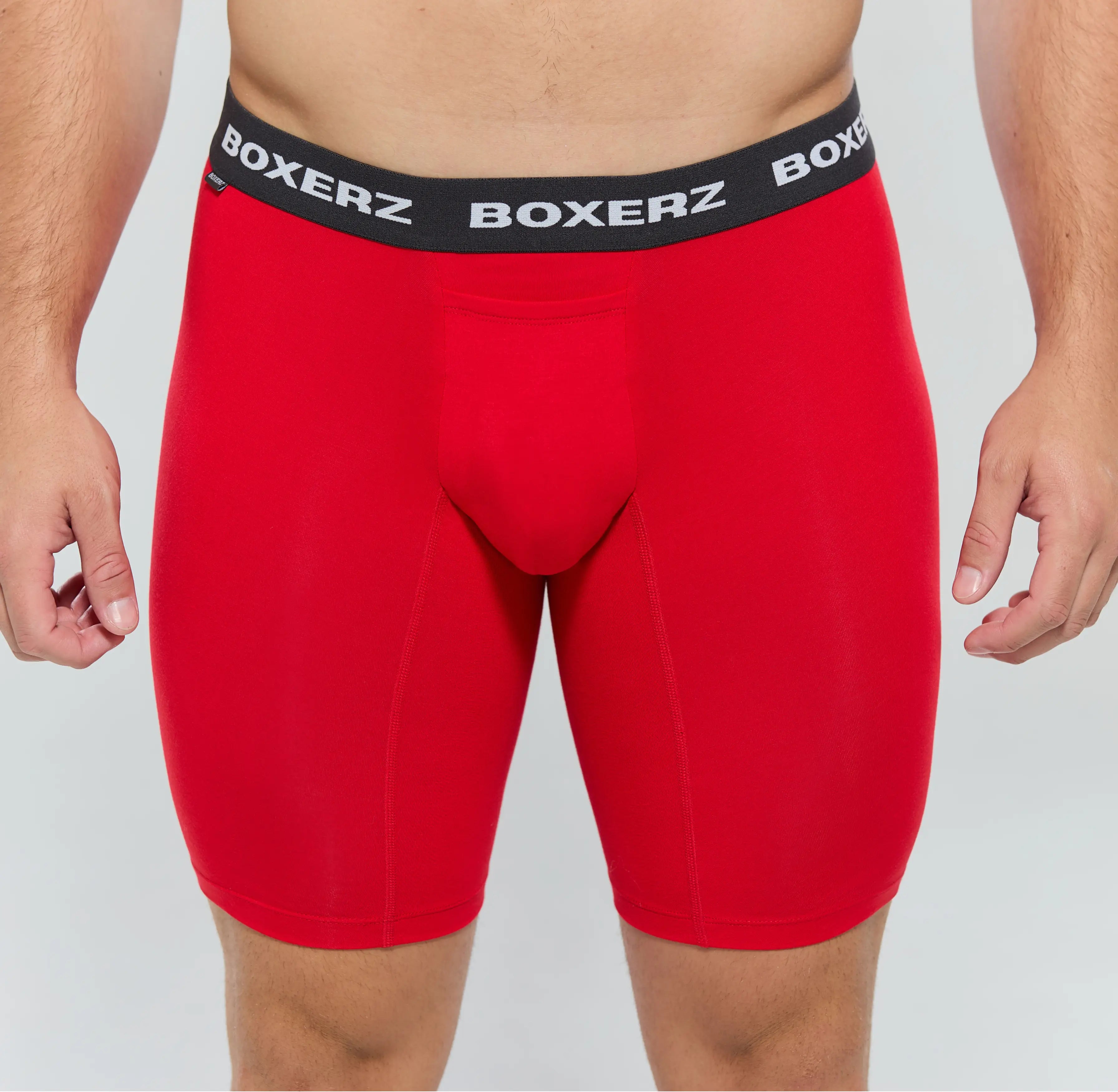 Front view of men's red Sports+ boxer briefs from Boxerz, showing logo waistband and contoured pouch