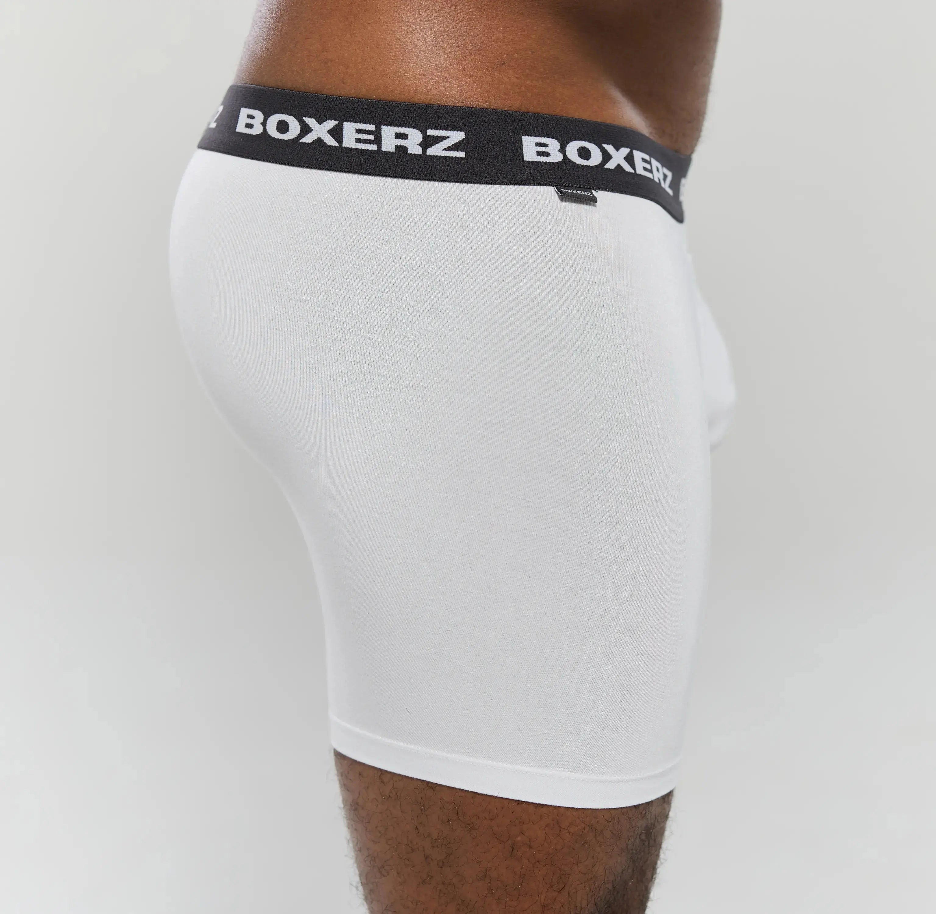 Side profile of Boxerz white boxer briefs, highlighting snug fit and stretch fabric
