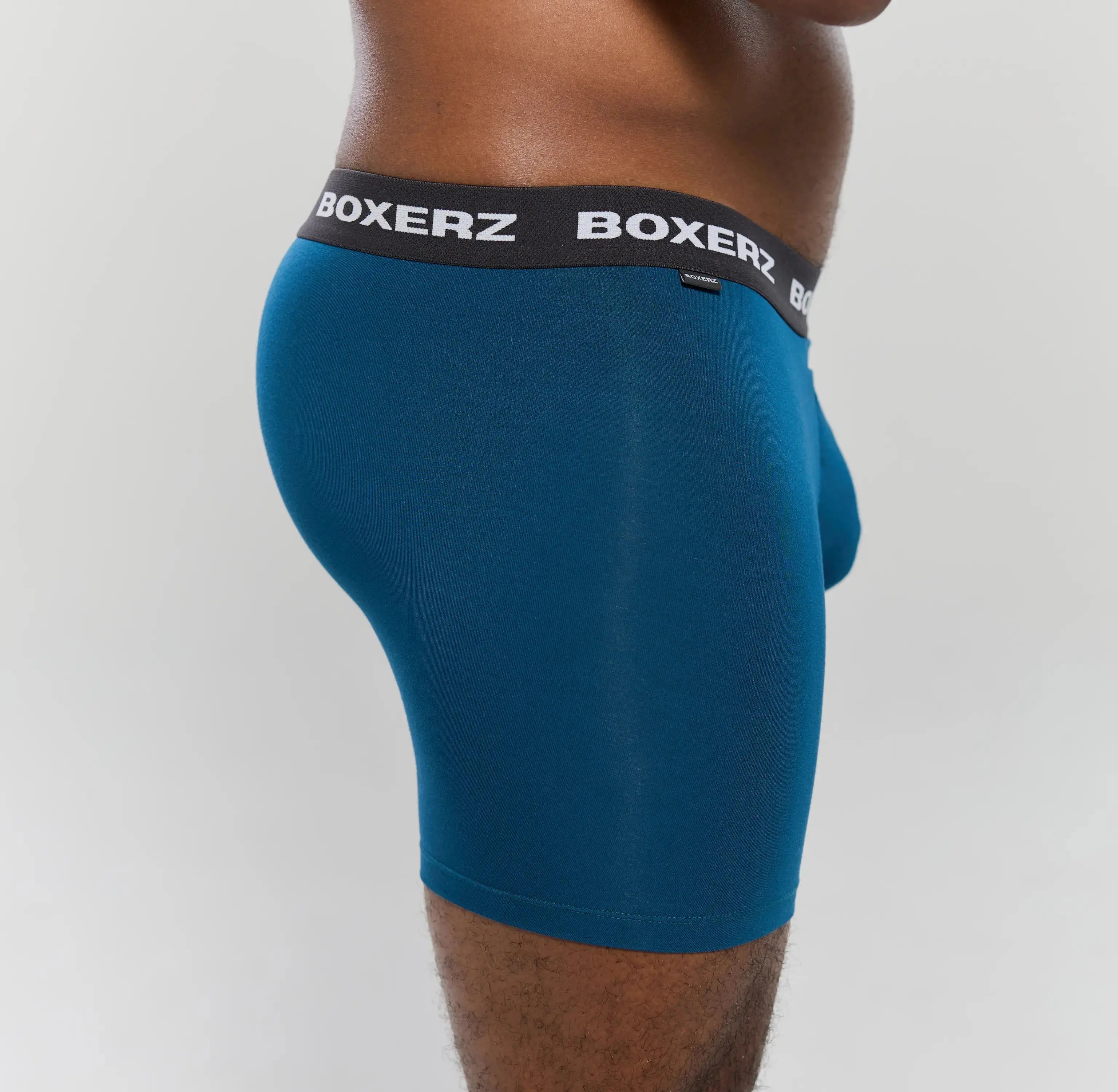 Side profile of Boxerz midnight blue boxer briefs, highlighting snug fit and stretch fabric