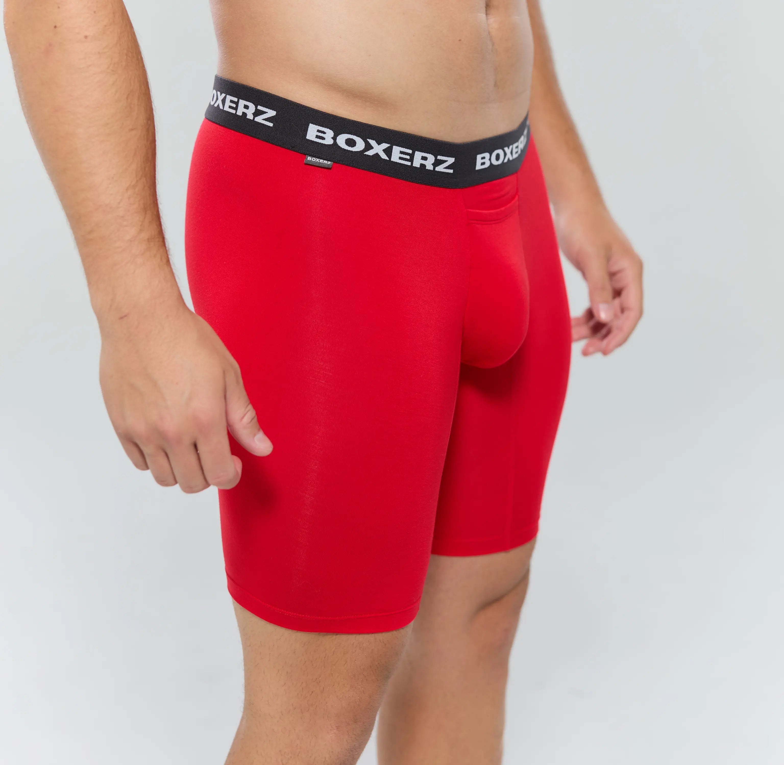 Close-up of Boxerz men's red boxer brief sports+, showing snug leg fit, soft micro modal fabric, and signature logo waistband