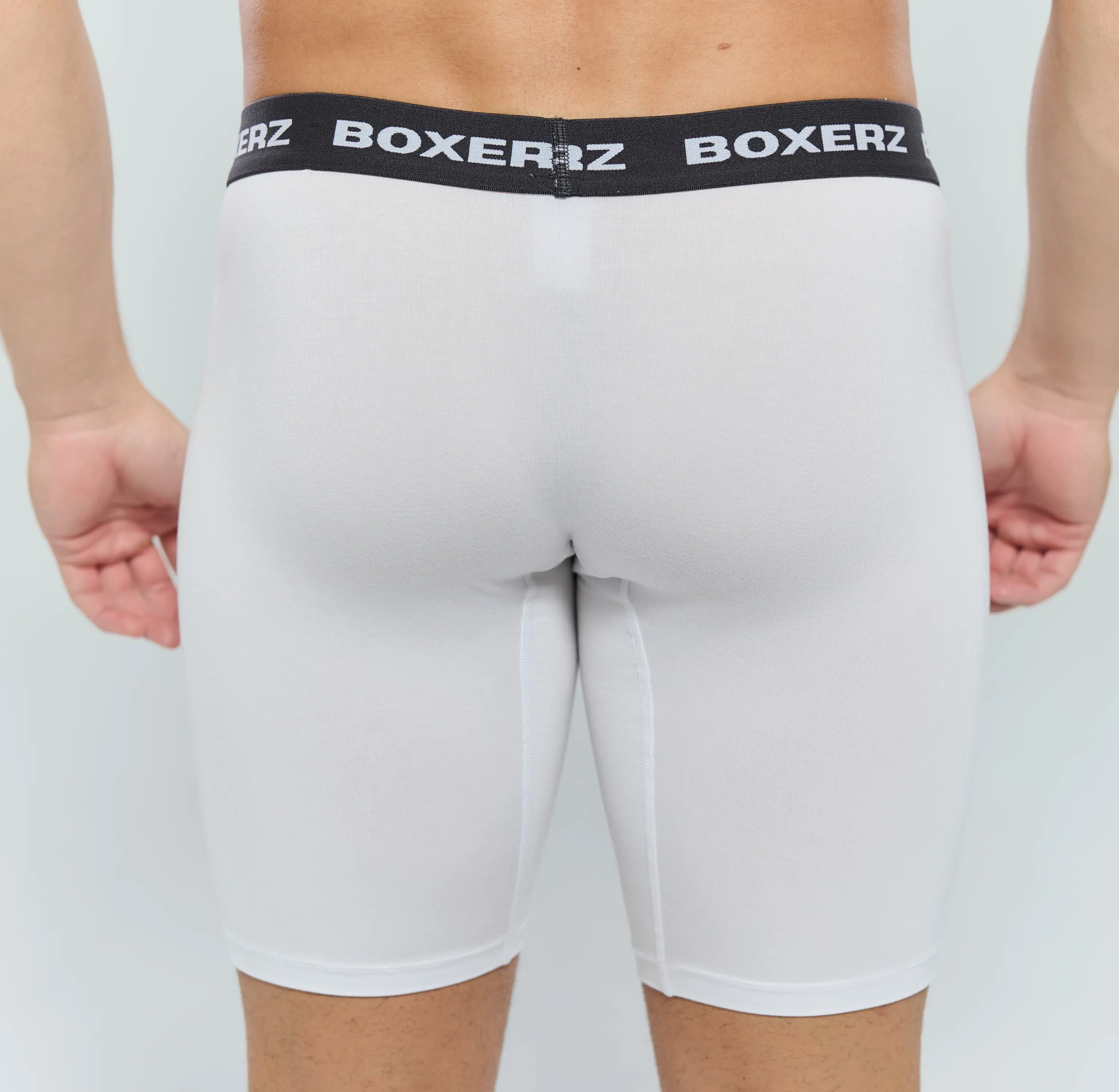 Rear view of men’s white boxer briefs from Boxerz, showcasing seamless fit and supportive design

